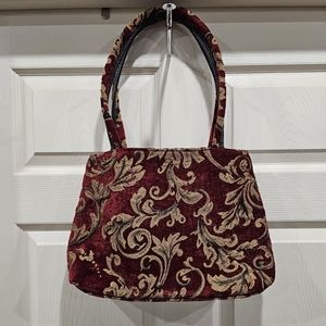 Velvet and gold handbag
